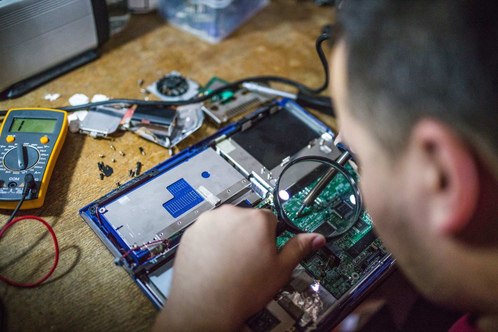 Technician repairing computer